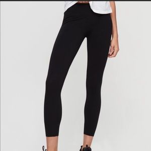 TNA cropped black leggings with raw hem. size XS